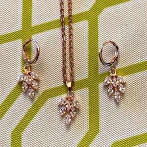 New!Necklace and earrings set In Rose Goldtone Costume